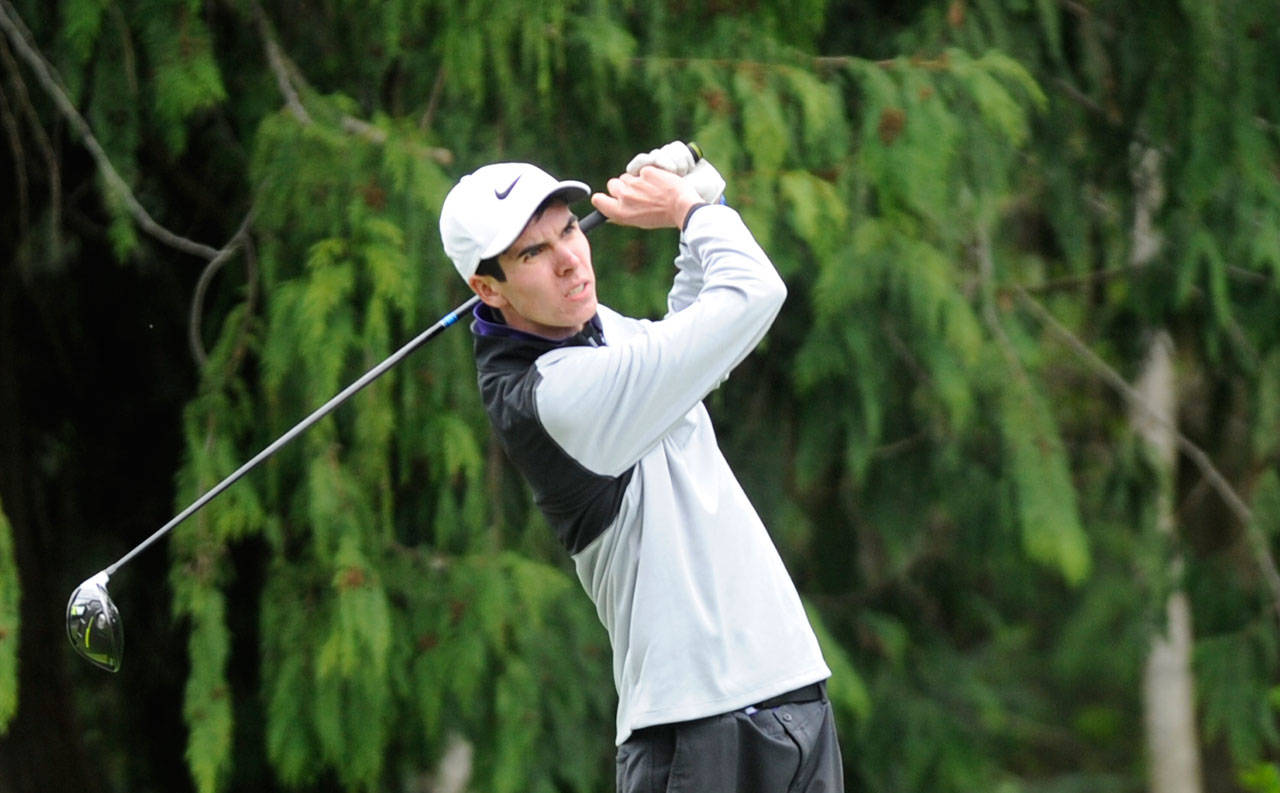 Blake Wiker, pictured here teeing off on the second hole at The Cedars at Dungeness golf course in Sequim on April 23, edged teammate Paul Jacobsen for medalist honors at the April 30 Olympic League tourney, also at The Cedars. Wiker, Jacobsen and Ben Sweet each earned state 2A tournament berths. Sequim Gazette file photo by Michael Dashiell