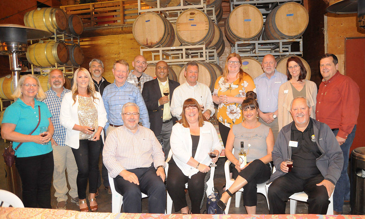 Members of the Port Angeles Chamber of Commerce and Sequim-Dungeness Valley Chamber of Commerce get together for a joint meeting at Olympic Cellars Winery on May 6. Sequim Gazette photo by Michael Dashiell