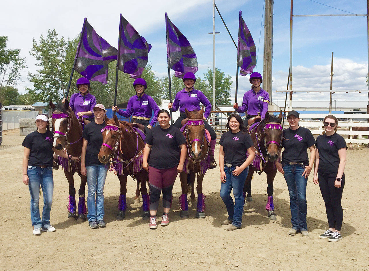 The Sequim Equestrian Team includes (back row), from left drill team members Miranda Williams, Grace Niemeyer, Abbi Priest and Yana Hoesel, with (front row, from left) coaches Sydney Balkan and Bettina Hoesel, Lilly Thomas, Abby Garcia, head coach Katie Salmon-Newton and coach Haylie Newton. Submitted photo
