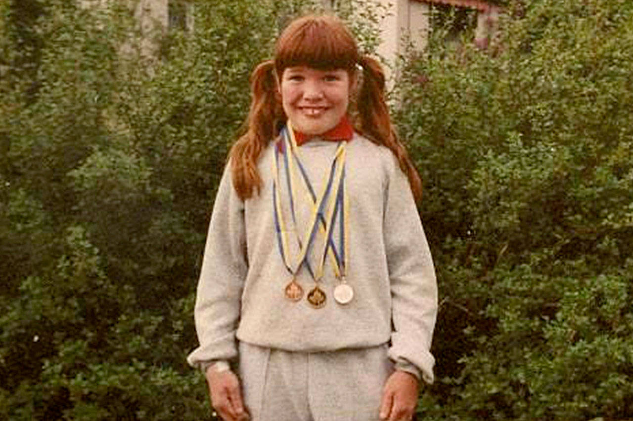 Kelly Yarnes earned a gold, silver and bronze medal at the 1988 International German American Special Olympics. For her efforts, a sign will go up outside Sequim with other gold medal winners. Photo courtesy of Laurie Yarnes