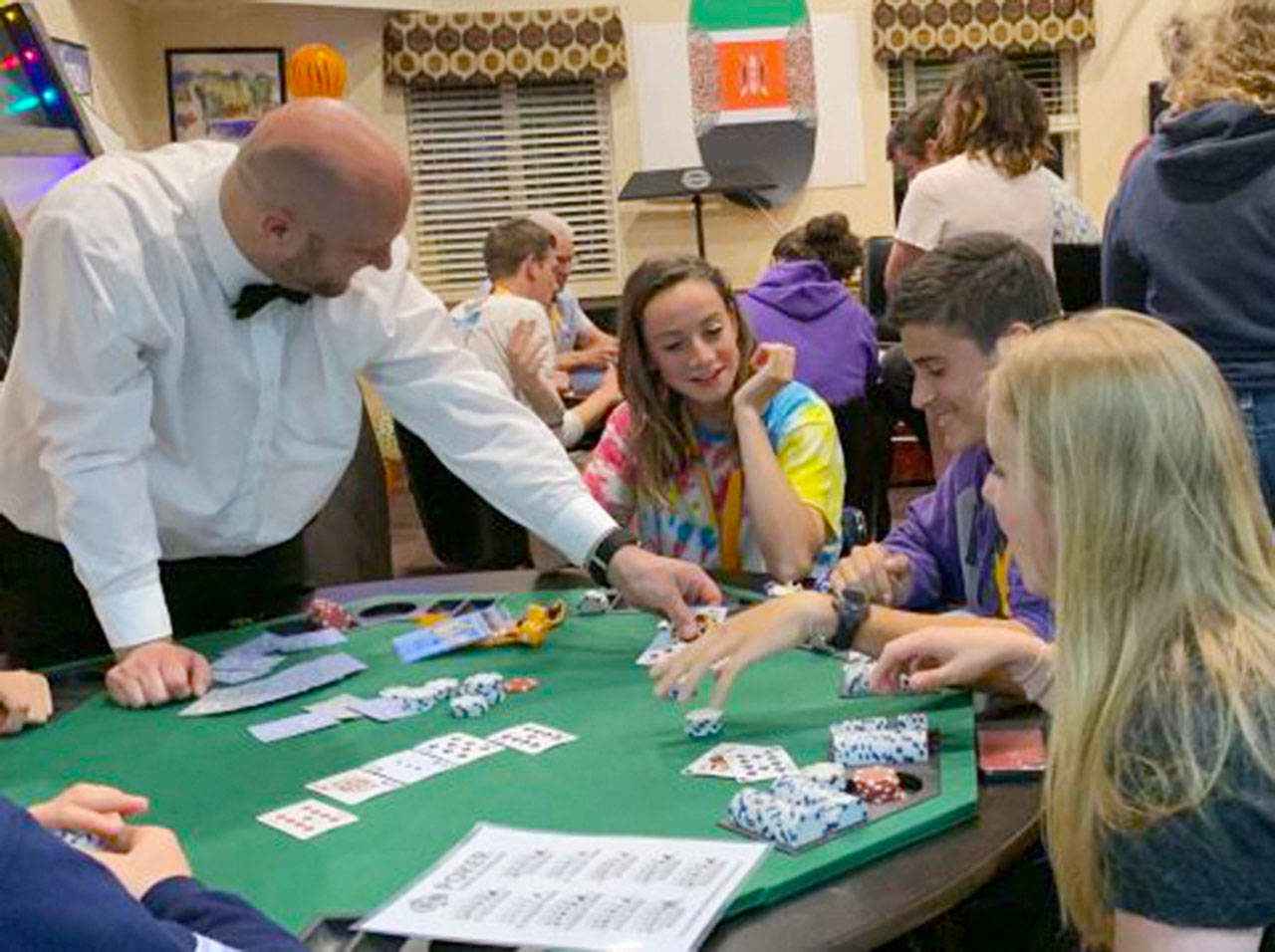 High school seniors enjoy card games at the Safe and Sober Graduation Party on June 7. Photo courtesy of Asma Weber