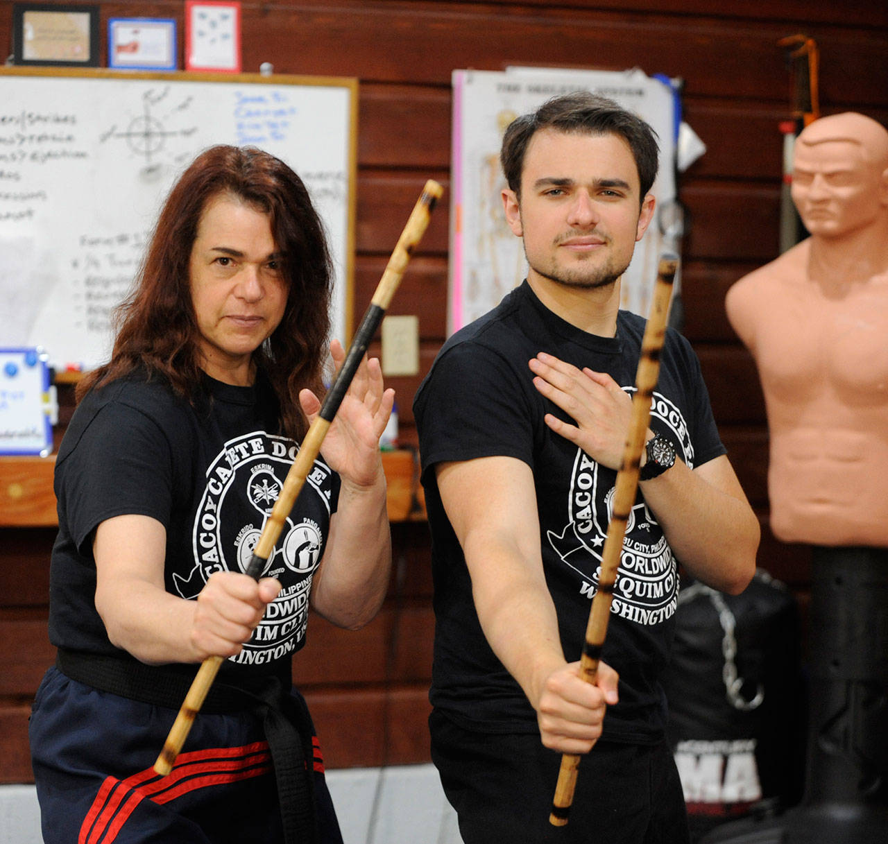 Kathrin Sumpter and her son Sam Manders are headed to Cebu City, Philippines, this August for the 10th biannual Cacoy Cañete Doce Pares World Invitational Tournament and Gathering. Sumpter owns and operates Cacoy Cañete Doce Pares Sequim Club/Sequim Martial Arts. Sequim Gazette photo by Michael Dashiell