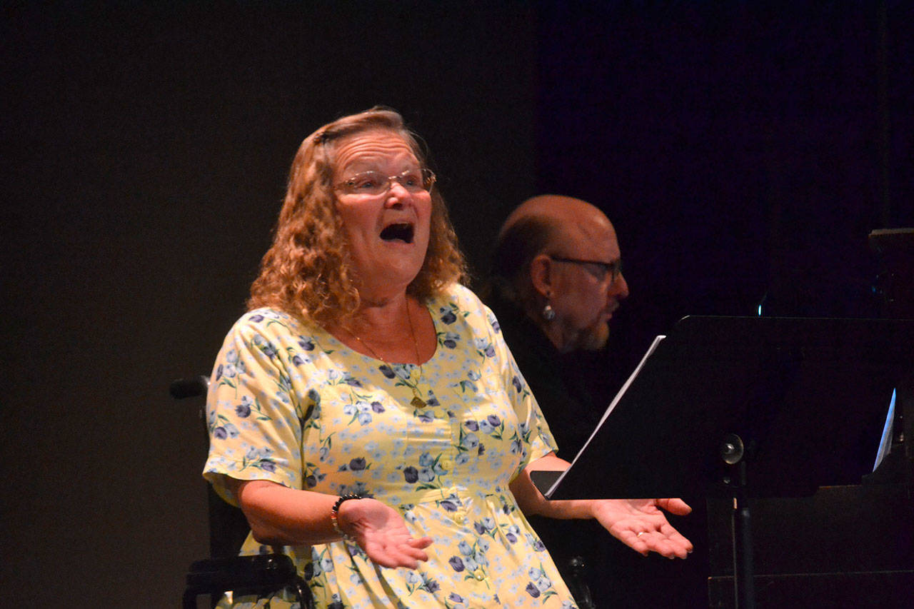 Kyra Humphrey sings “I want my Life Back” in Olympic Theatre Arts’ upcoming play “Another Night Before Christmas,” which her husband Steven serves as musical director for Dec. 13-22 in OTA’s 40th season. Sequim Gazette photo by Matthew Nash