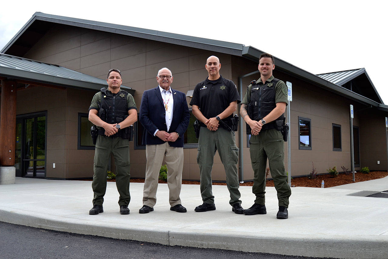 The new Public Safety and Justice Center for the Jamestown S’Klallam Tribe offers bigger space for tribal officers Patrick Carter, left, Police Chief Rory Kallappa and Jason Robbins. Ron Allen, Jamestown tribal chairman and CEO, second from left, said “when people come here whether for a case or any regard with a judicial or public safety matter, they know they’re walking into a place that reflects professionalism and integrity of a quality law enforcement system.” Sequim Gazette photo by Matthew Nash