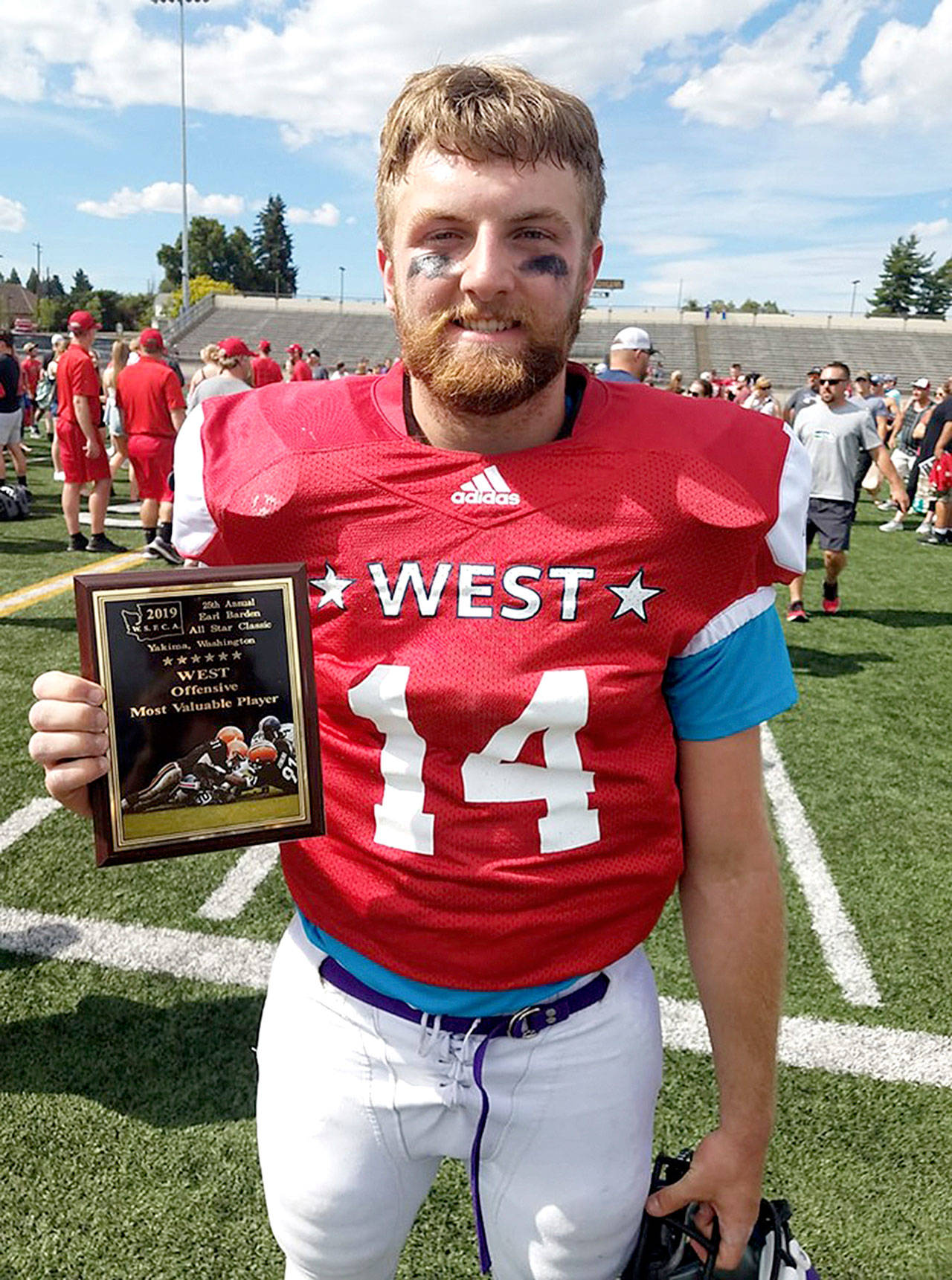 Sequim’s Riley Cowan was named the West Team’s offensive MVP in the 25th annual Earl Barden All-Star Classic on June 22. Cowan rushed for 35 yards and threw a touchdown pass for the West. Submitted photo