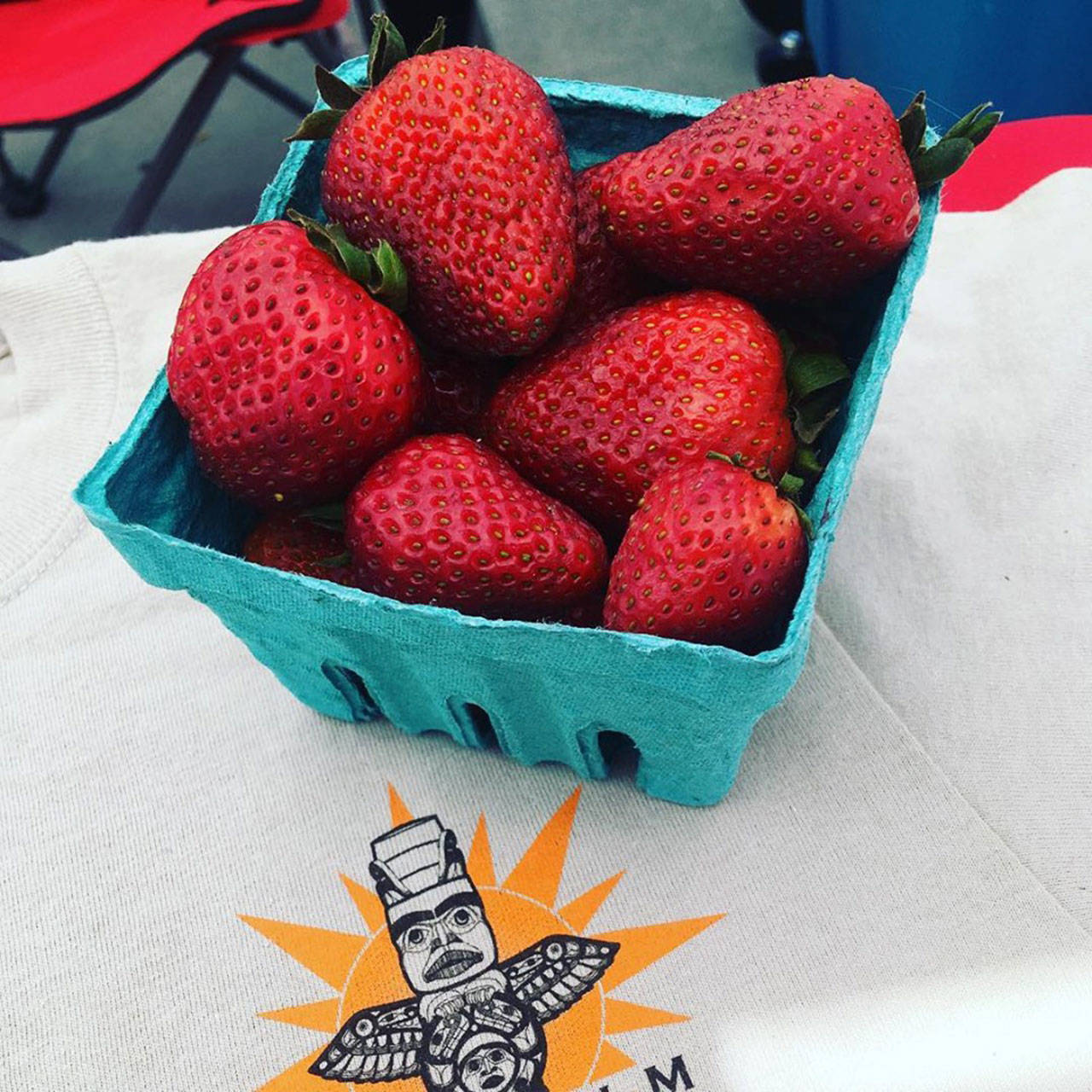 Check out local fruit such as these strawberries from Joy Farm, at the Sequim Farmers Market. Submitted photo