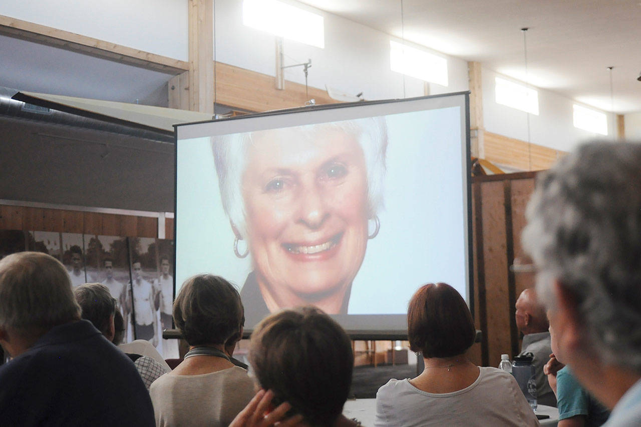 Friends and family gather to remember Judith McInnes Tozzer and celebrate the opening of a section of the Sequim Museum & Arts building dedicated in her honor. Sequim Gazette photo by Michael Dashiell
