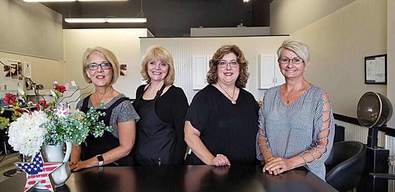 Cosmetologists take a break in their busy day. From left, Debbie Weinheimer, Joanne Beres, owner Annette Rockenbrant and manicurist Donna Knobloch. Submitted photo