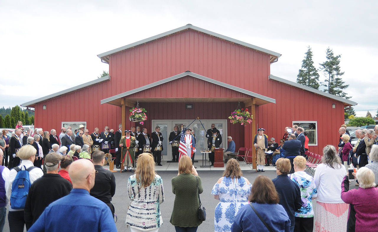 A crowd gathers outside the new Sequim Museum & Arts exhibit center at 544 N. Sequim Ave. for its grand opening on July 6. Sequim Gazette photo by Michael Dashiell