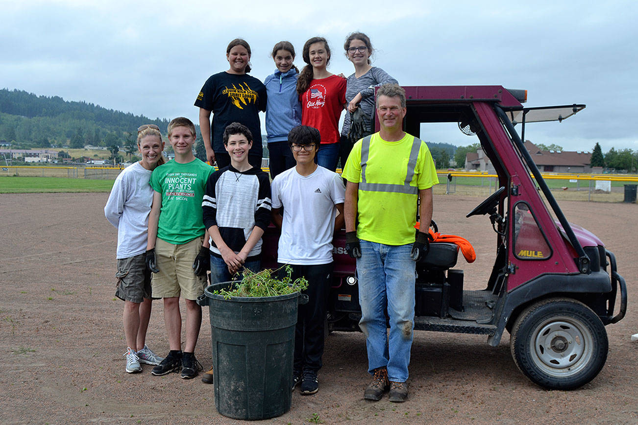 Students clean Carrie Blake Park for funds for exchange program