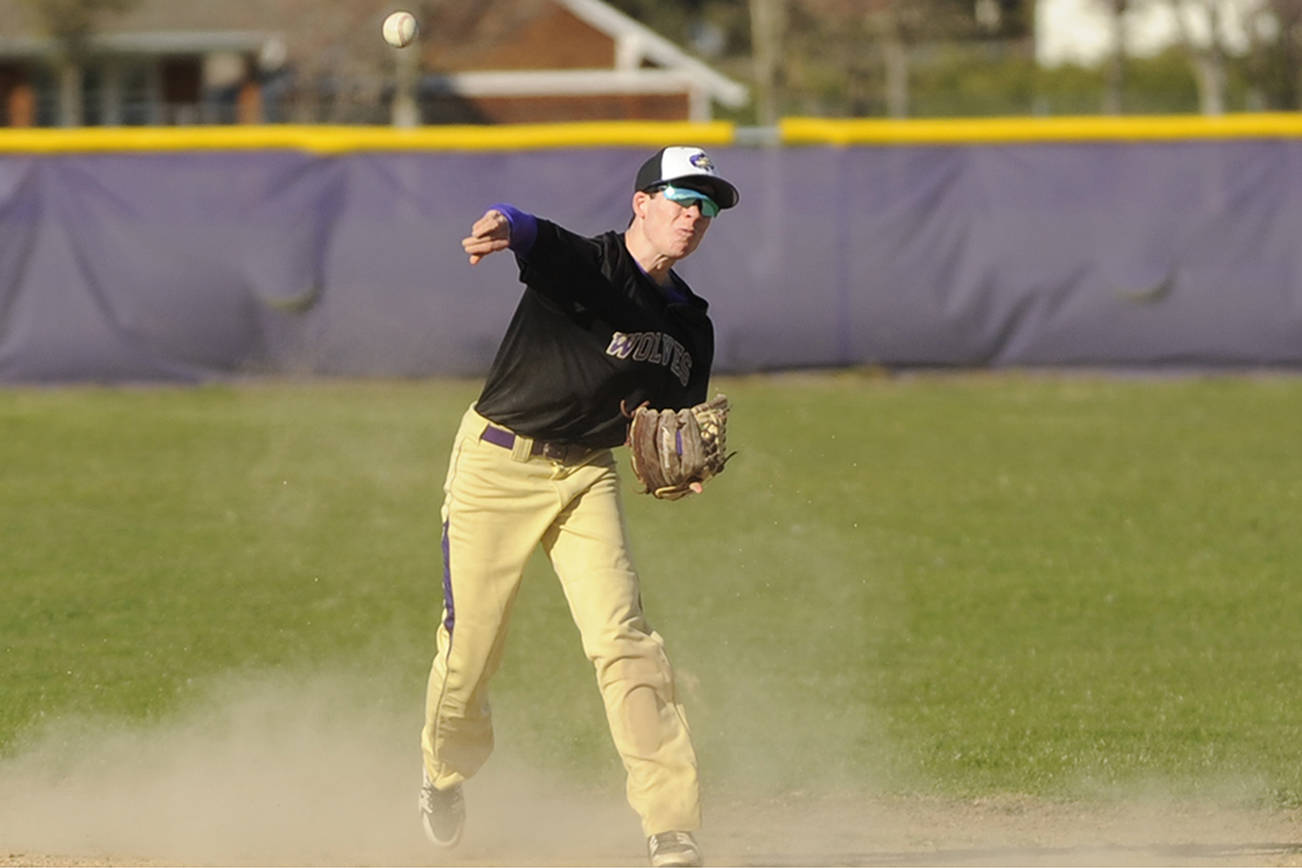 Wilder Junior Baseball Club second baseman Michael Grubb, pictured here playing for Sequim High School in March, “tore it up all weekend” at the American Legion AA Area 1 district tournament according to coach Zac Moore. Grubb and the rest of the Wilder Junior squad will head to the state tournament in Yakima on July 27. Sequim Gazette file photo by Michael Dashiell