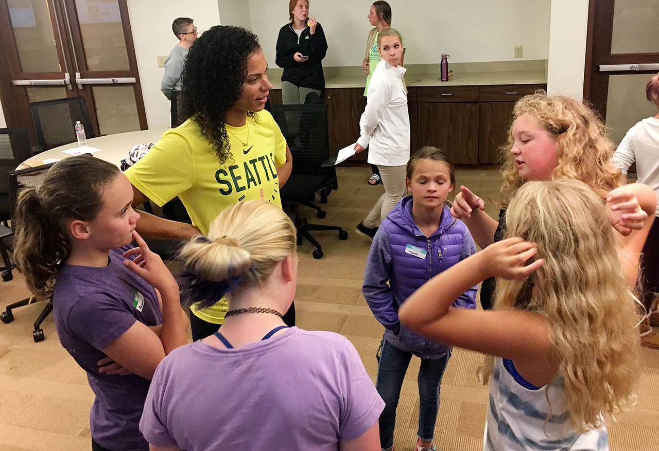 Boys & Girls Club campers meet with Seattle Storm forward Alysha Clark during a recent visit to Swedish Hospital.