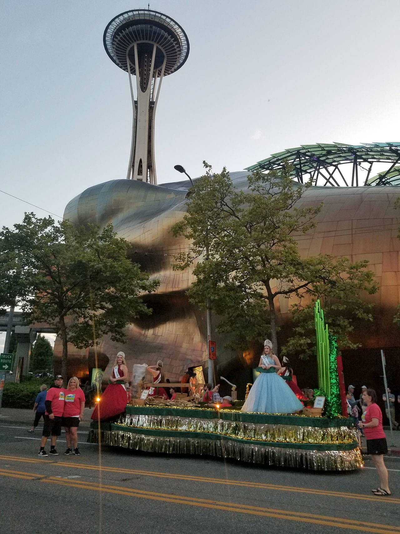 For the Torchlight Parade, volunteers and royalty with the Sequim Irrigation Festival parked below the Space Needle. That night, they won the “Light of the Night” award for their festive float based on the “Wizard of Oz.” Photo courtesy Jim Stoffer/Sequim Irrigation Festival