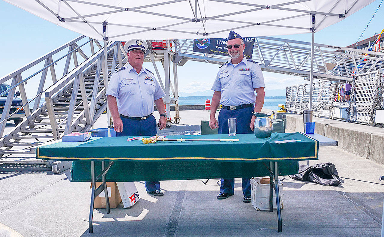 Alan Smith, left, of Sequim, and Jim McLaughlin of Port Angeles welcome visitors to the U.S. Coast Guard Cutter Active during the 2019 Seafair in Seattle. Photo courtesy of USCG Auxiliarist Jim McLaughlin