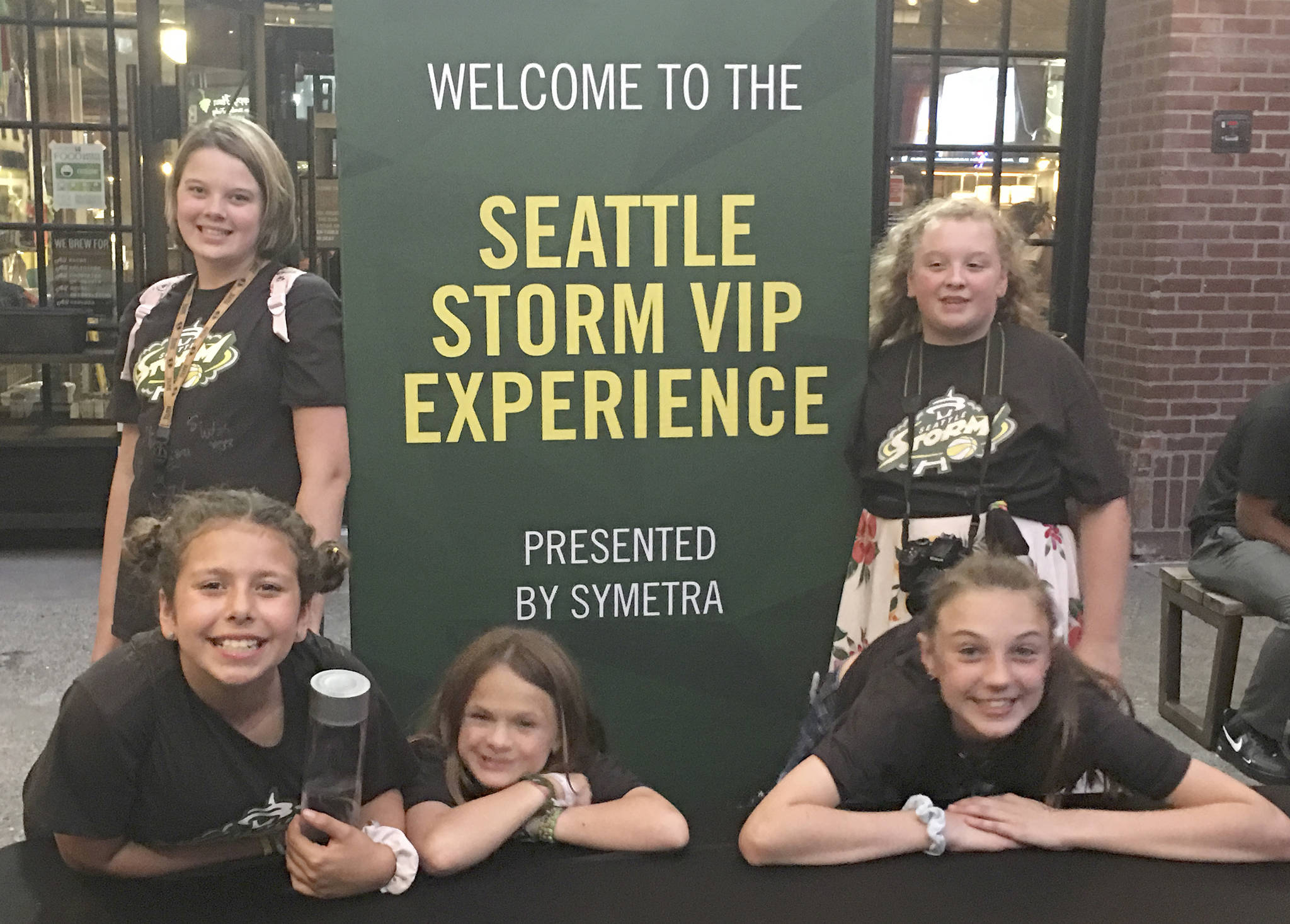 Members of the Sequim Boys & Girls Club visit with the Seattle Storm basketball team earlier this month at Swedish Hospital in Seattle, playing games and hanging out with the WNBA players. Submitted photo