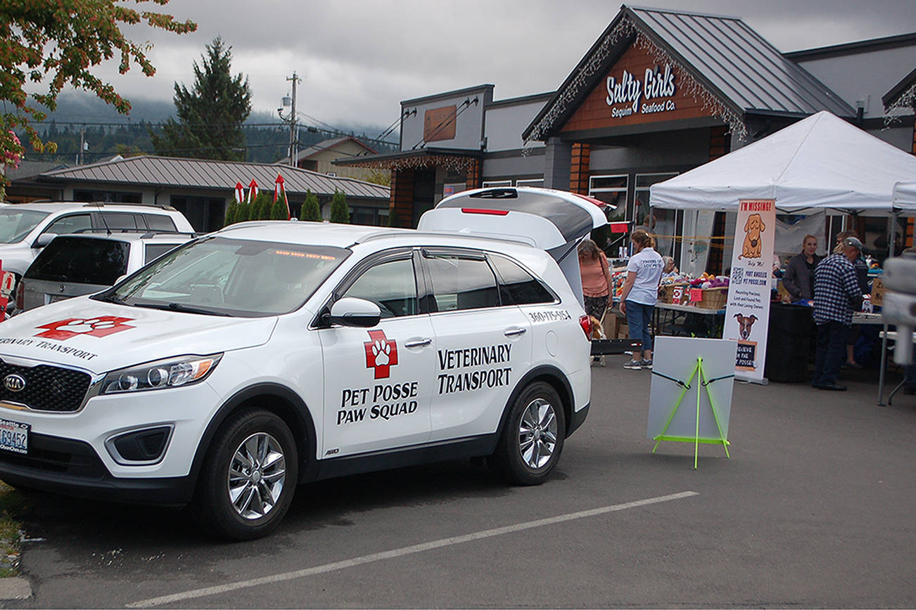 The Pet Posse veterinary transport vehicle parked in front of the Barks & Brews fundraiser event put on at the Peninsula Taproom on Aug. 10 to support the organization. Barks & Brews attracted more than 70 attendees and raised more than $5,000. Sequim Gazette photo by Conor Dowley