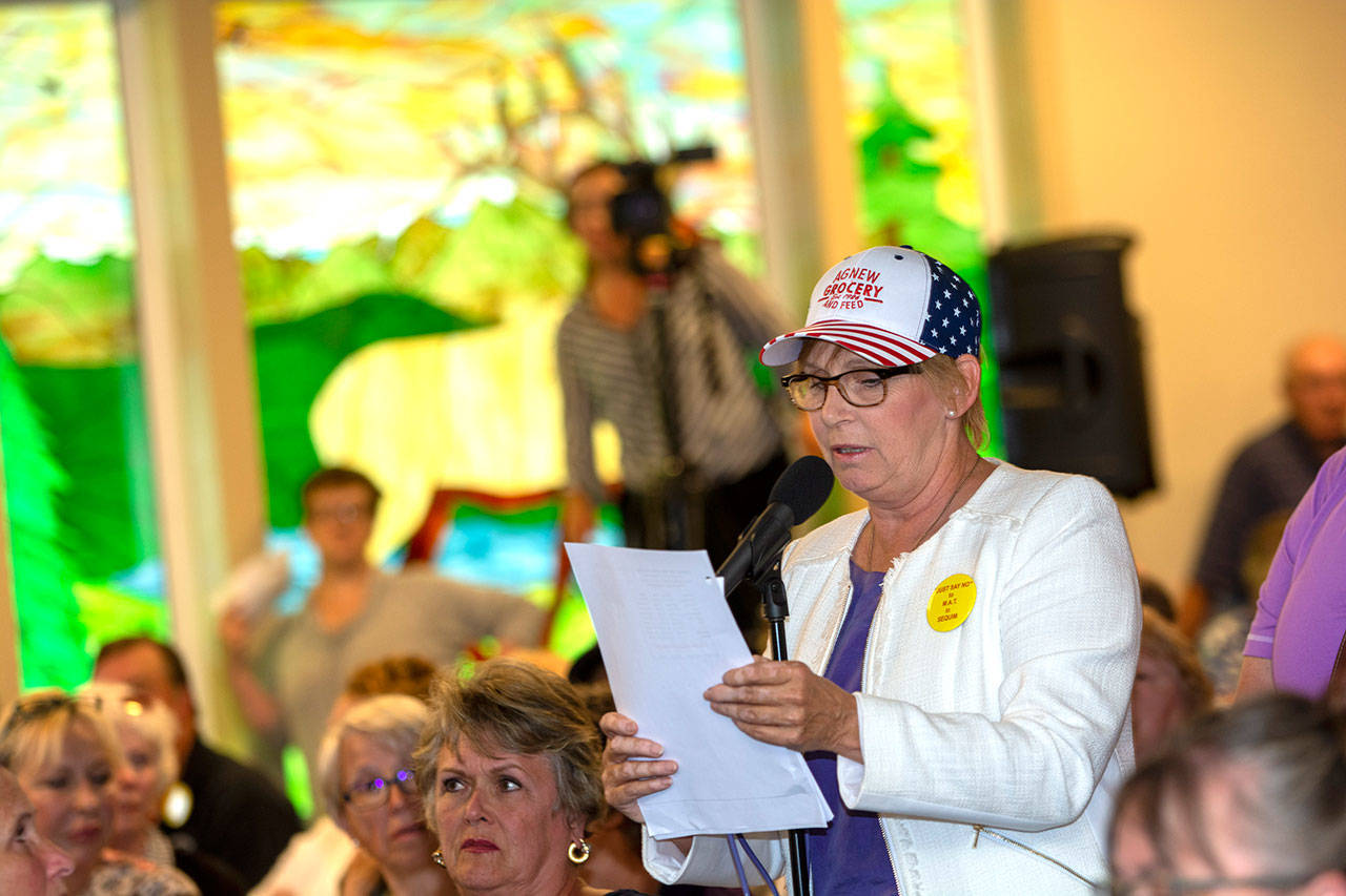 Jodi Wilke, a co-leader of Save our Sequim, speaks during the Jamestown S’Klallam Tribe’s town hall meeting concerning its planned medication-assisted treatment center in Sequim on Aug. 8. (Jesse Major/Peninsula Daily News)