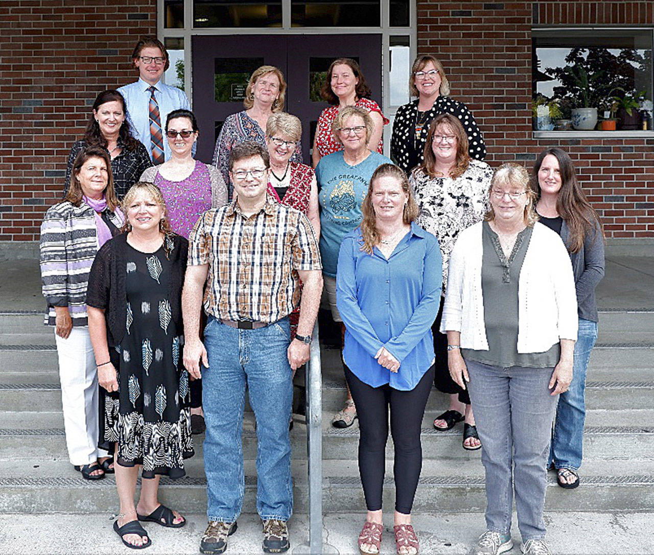 The Sequim School District welcomed a number of new teachers last week as the district prepares for the first day of school on Wednesday, Sept. 4. Pictured are (back row, from left) Natalie Fortier (Greywolf Elementary School), Konstantin Semerikov (Sequim Middle School), Melissa Dempsey (SMS), Cheryl Gardner (Greywolf) and Kylie Douglas (Greywolf), (middle row, from left) training facilitator Pam Landoni with Lisa Beaver Williams (Helen Haller Elementary School), Linda DeIvernois (Sequim High School), Mary Himley (Helen Haller), Saxon Holt (Helen Haller) and Kami Sorensen (Greywolf), with (front row, from left) Denise Dahll (Sequim High), Keith Lee (Helen Haller), Kristin Mooney (Helen Haller) and Jennifer Lane (Greywolf). Photo courtesy of Sequim School District