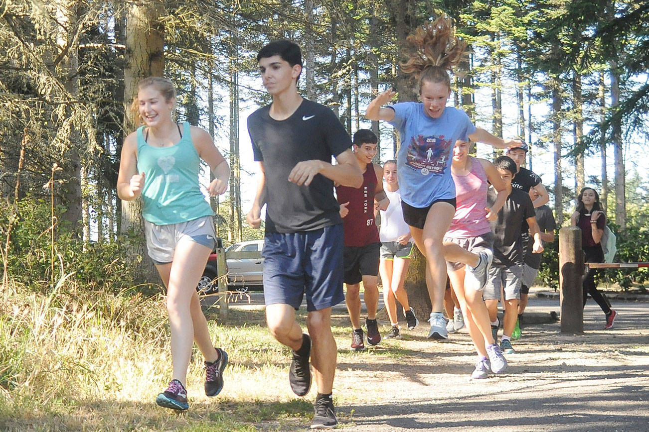 Fall sports preview: New cross country coach leads Wolfpack squads into season