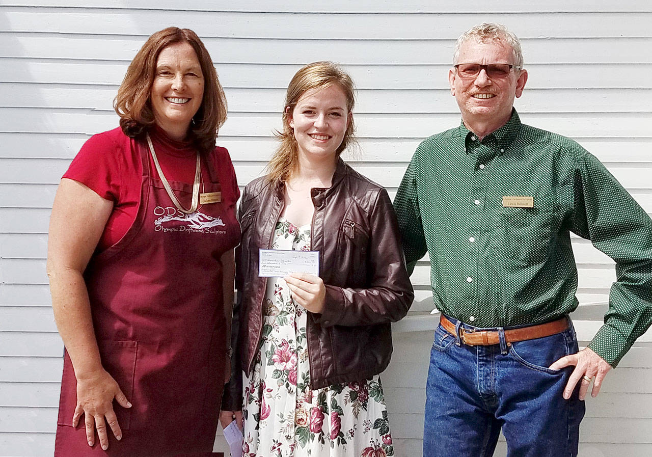 Pictured, from left, are: Colleen Bittner, Olympic Driftwood Sculptors Club scholarship committee co-chair; scholarship recipient Savanah Wise, and scholarship committee co-chair Lewis Bennett. Submitted photo
