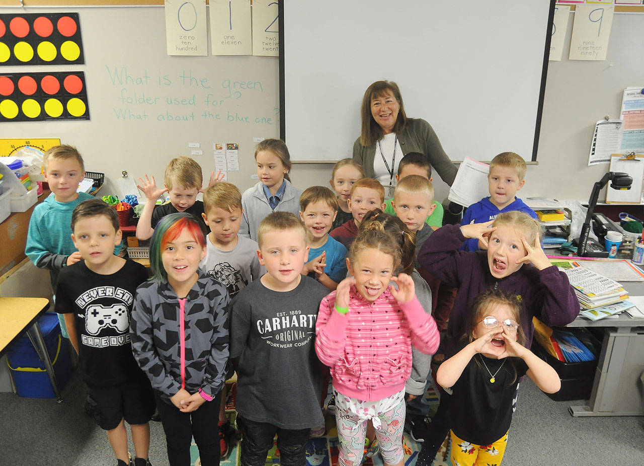First day wackiness: Students in Monique Brasher’s first grade class at Greywolf Elementary share some funny faces at their first day of school on Sept. 4. Sequim Gazette photo by Michael Dashiell