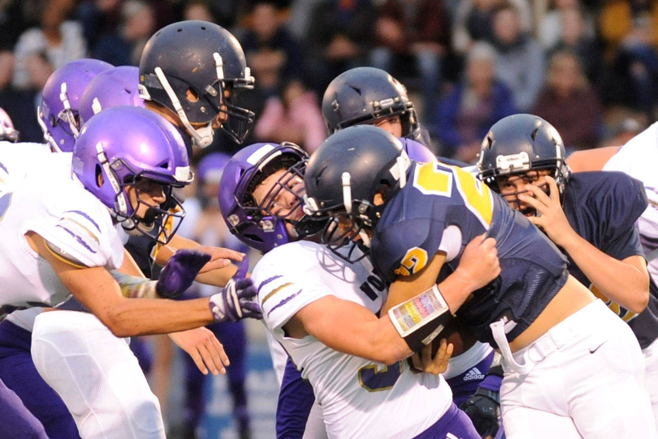 Football: Sequim runs away with win at Forks