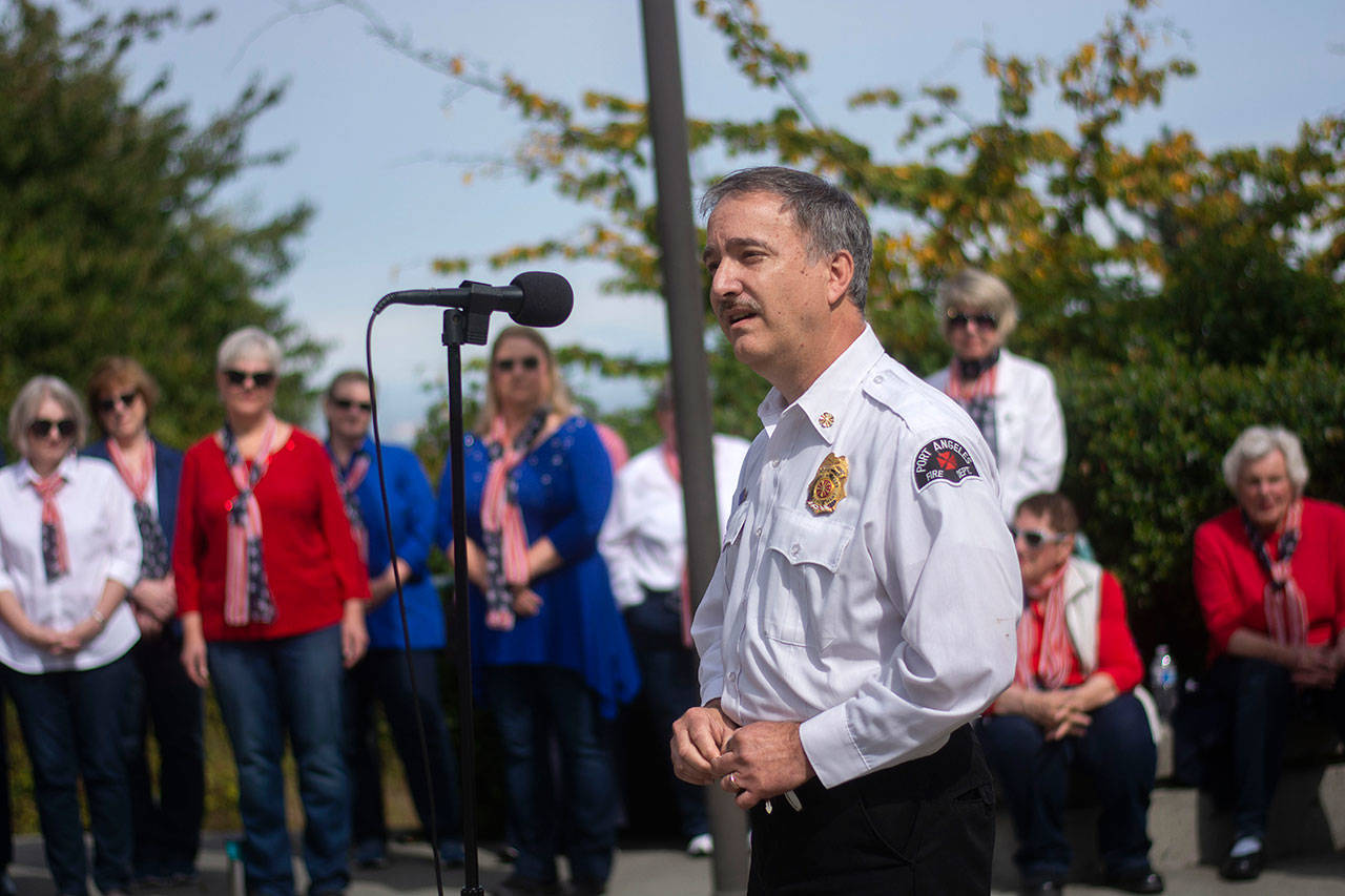Port Angeles Fire Chief Ken Dubuc speaks during a ceremony in Port Angeles honoring public safety officials on the 18th anniversary of the 9/11 terrorist attacks Wednesday. (Jesse Major/Peninsula Daily News)