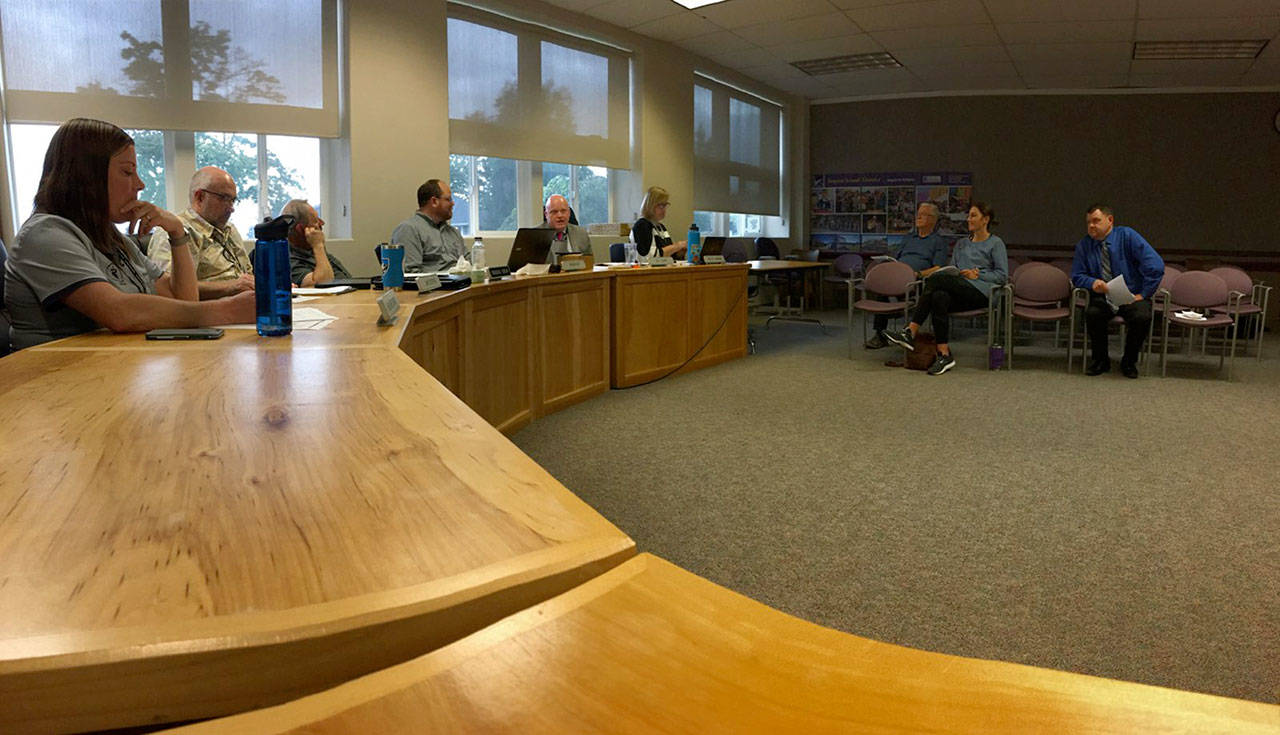 Sequim School Board directors and candidates for director positions meet for a work session in mid-September to discuss communications protocol, possibly extending interim superintendent Dr. Rob Clark’s contract, and timelines for possible board decisions on policies and ballot measures. Sequim Gazette photo by Matthew Nash