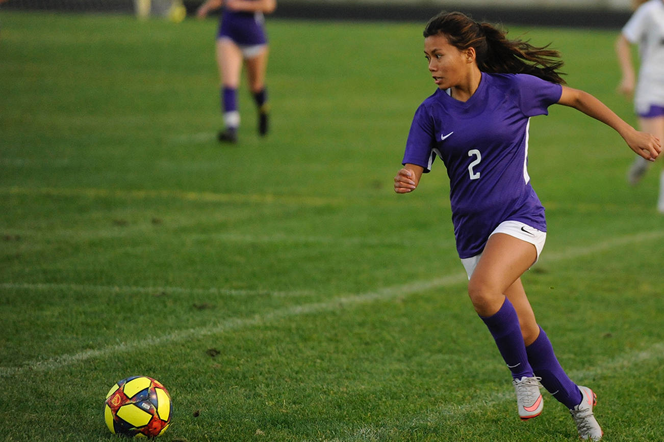 Kristina Mingoy runs down the wing early in the first half.