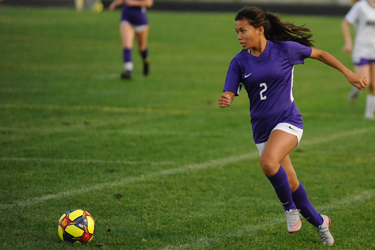 Kristina Mingoy runs down the wing early in the first half.