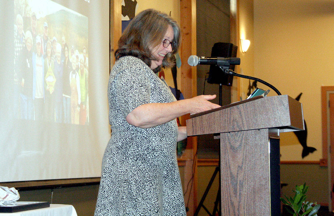 Cheri Scalf speaks Thursday morning in front of about 200 people at the Fort Worden Commons as she is honored with the 2019 Eleanor Stopps Environmental Leadership award. Photo by Brian McLean/Peninsula Daily News