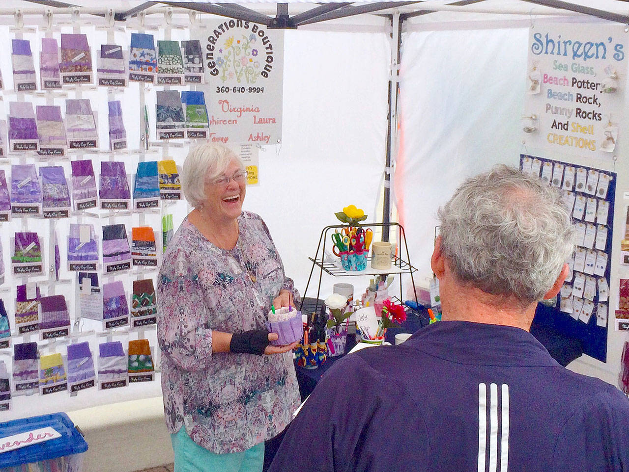 Virginia Sheppard of Generations Boutique showcases her artistic, hand-made products at the Sequim Farmers Market. Photo courtesy of April Hammerand/Sequim Farmers Market