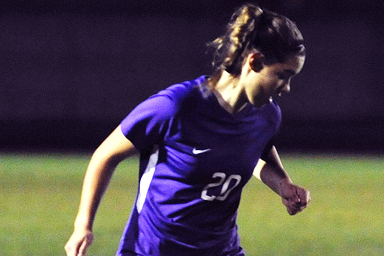 Hope Glasser turns on the ball in the second half of the Sequim Wolves’ 2-1 senior night win over the North Mason Bulldogs on Oct. 24. Glasser scored both Sequim goals to bring her season total to six goals, and helped bring the team closer to a district playoff berth. Sequim Gazette photo by Conor Dowley