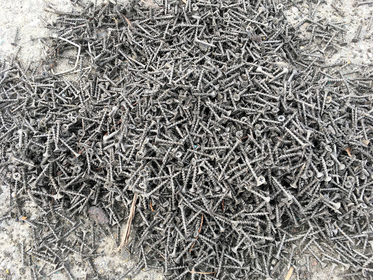 Crews with the state Department of Transportation recovered hundreds of screws from U.S. Highway 101 east of Port Angeles. Photo courtesy of State Patrol