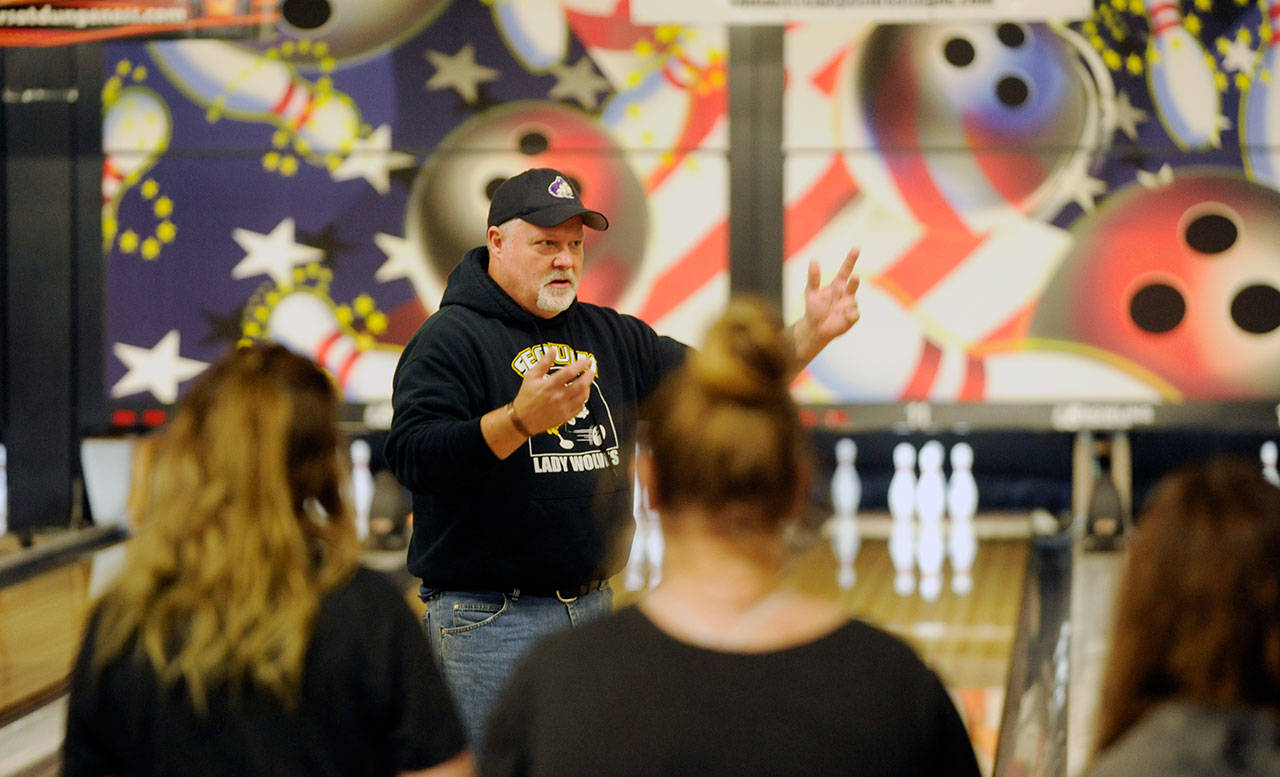 Now in his 11th year, Sequim coach Randy Perry talks with his team at a preseason practice at Port Angeles’ Laurel Lanes on Nov. 4. Sequim Gazette photos by Michael Dashiell