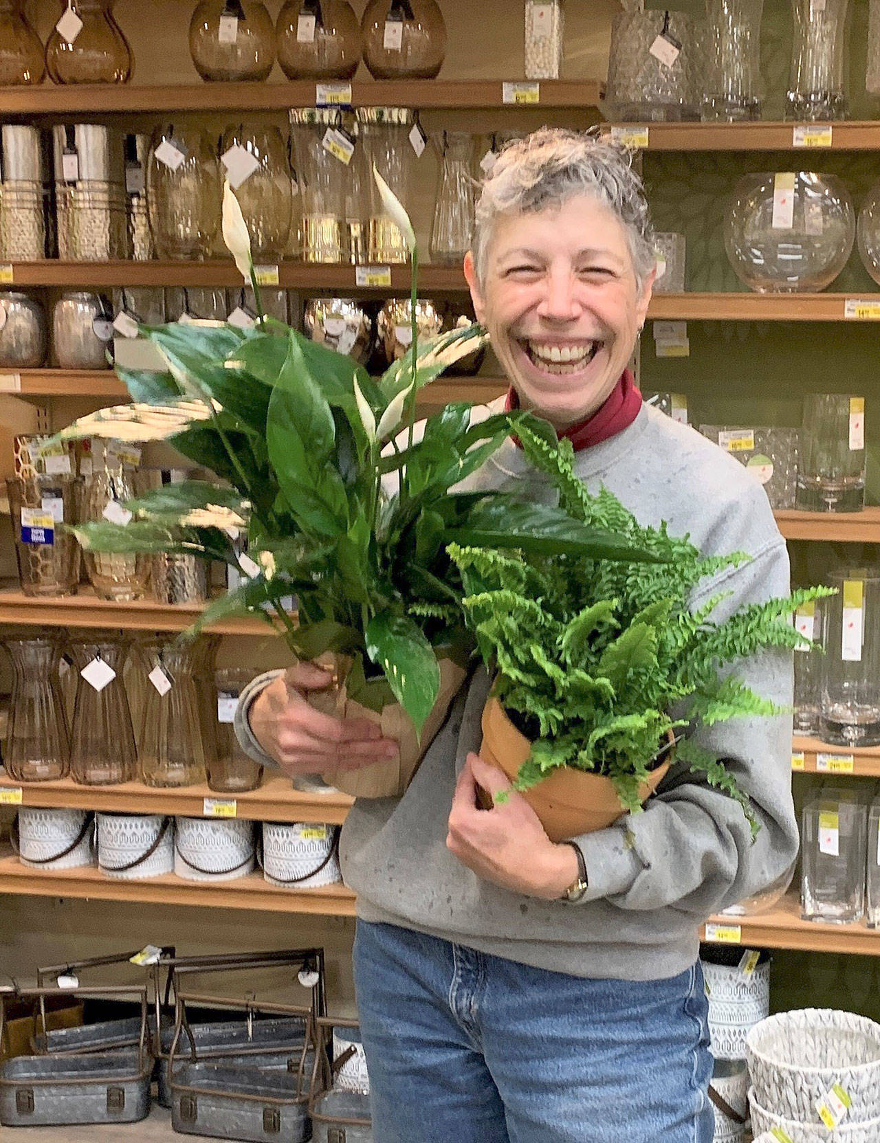 Jeanette Stehr-Green, pictured here in Sequim Safeway where she found an abundant variety of houseplants that beat the winter blues, presents at the next Green Thumb Gardening Tips Education Series lecture on Nov. 14. Photo by Betty Harriman