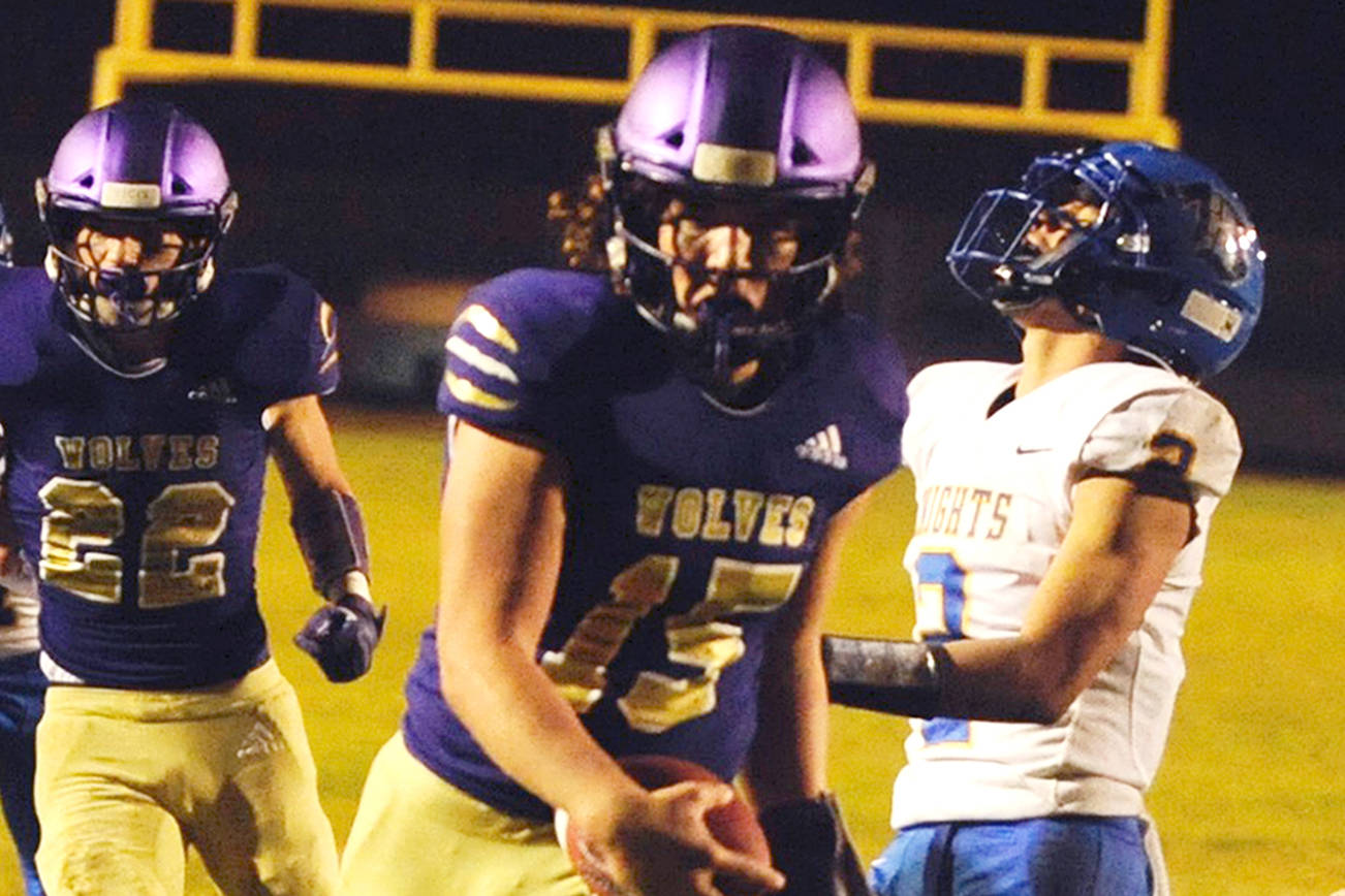 Taig Wiker celebrates as he crosses the goal line for his fourth rushing touchdown of the night in the Sequim Wolves’ 36-21 win against the Bremerton Knights on Nov. 1. Sequim Gazette photo by Conor Dowley