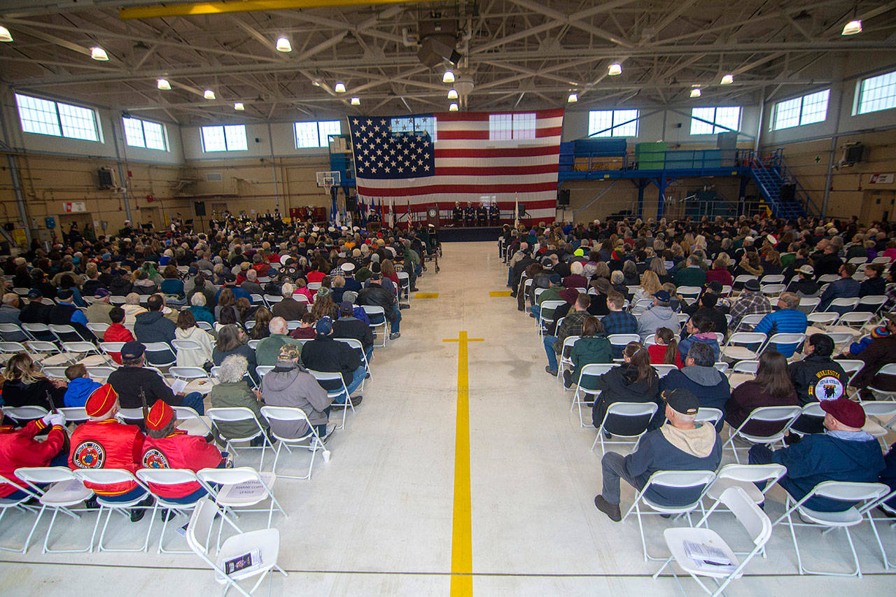 Hundreds attend the Veterans Day ceremony at U.S. Coast Guard Air Station/Sector Field Office Port Angeles on Monday. (Jesse Major/Peninsula Daily News)