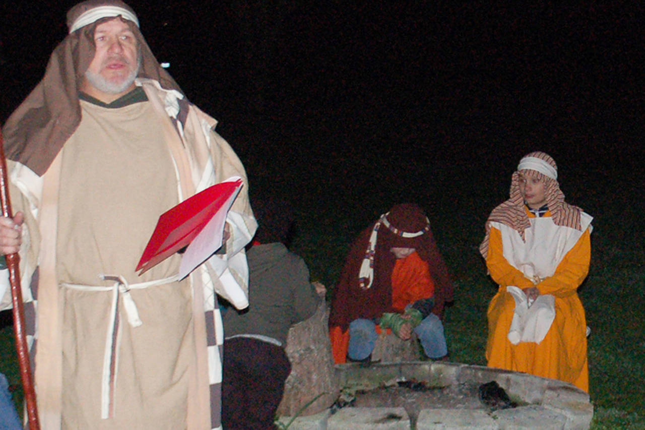 Pastor Jerry Luengen, left, practices his role as Josaiah in a Nov. 20 dress rehearsal for the Sequim Valley Nazarene Church living nativity performance. The nativity will be performed four times each night at the church on Dec. 6-8. Sequim Gazette photo by Conor Dowley