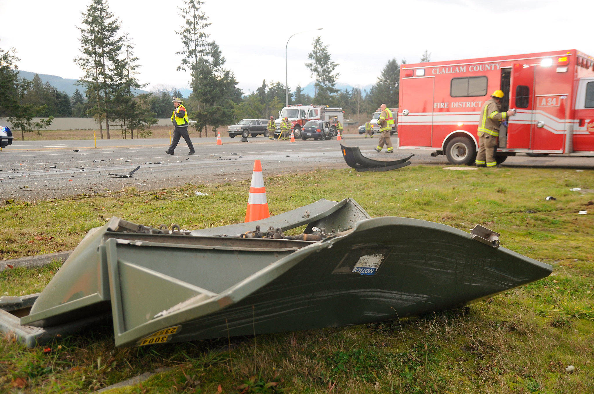 A transformer was destroyed in a wreck on Dec. 3 that sent two Sequim people and a Port Angeles woman to area hospitals. The Sequim driver was driving without insurance and a suspended license. Sequim Gazette photo by Michael Dashiell