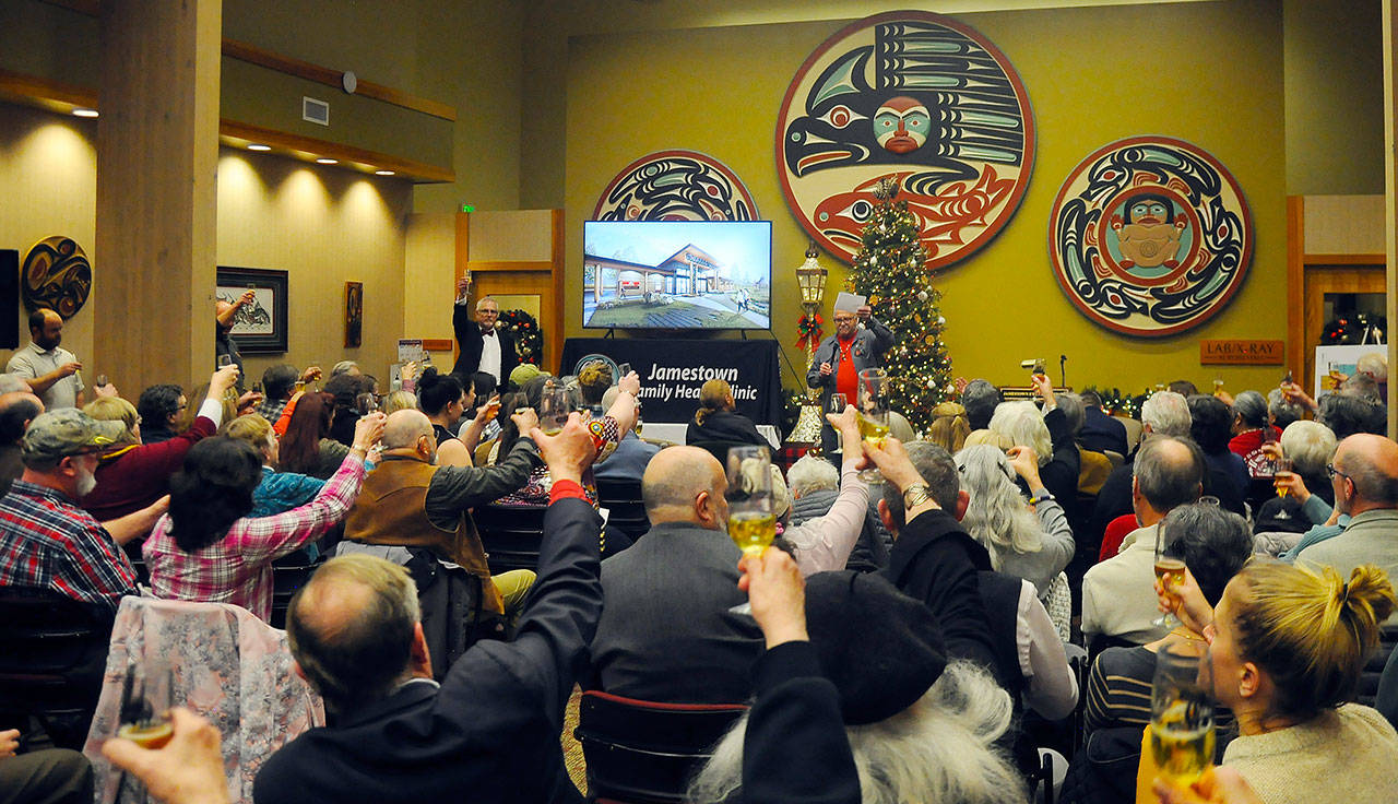 Jamestown S’Klallam Tribe leaders and advocates of the tribe’s proposed medicine-assisted treatment (MAT) facility have a (non-alcoholic) toast at a reveal of the MAT clinic design on Dec. 5. Sequim Gazette photo by Michael Dashiell