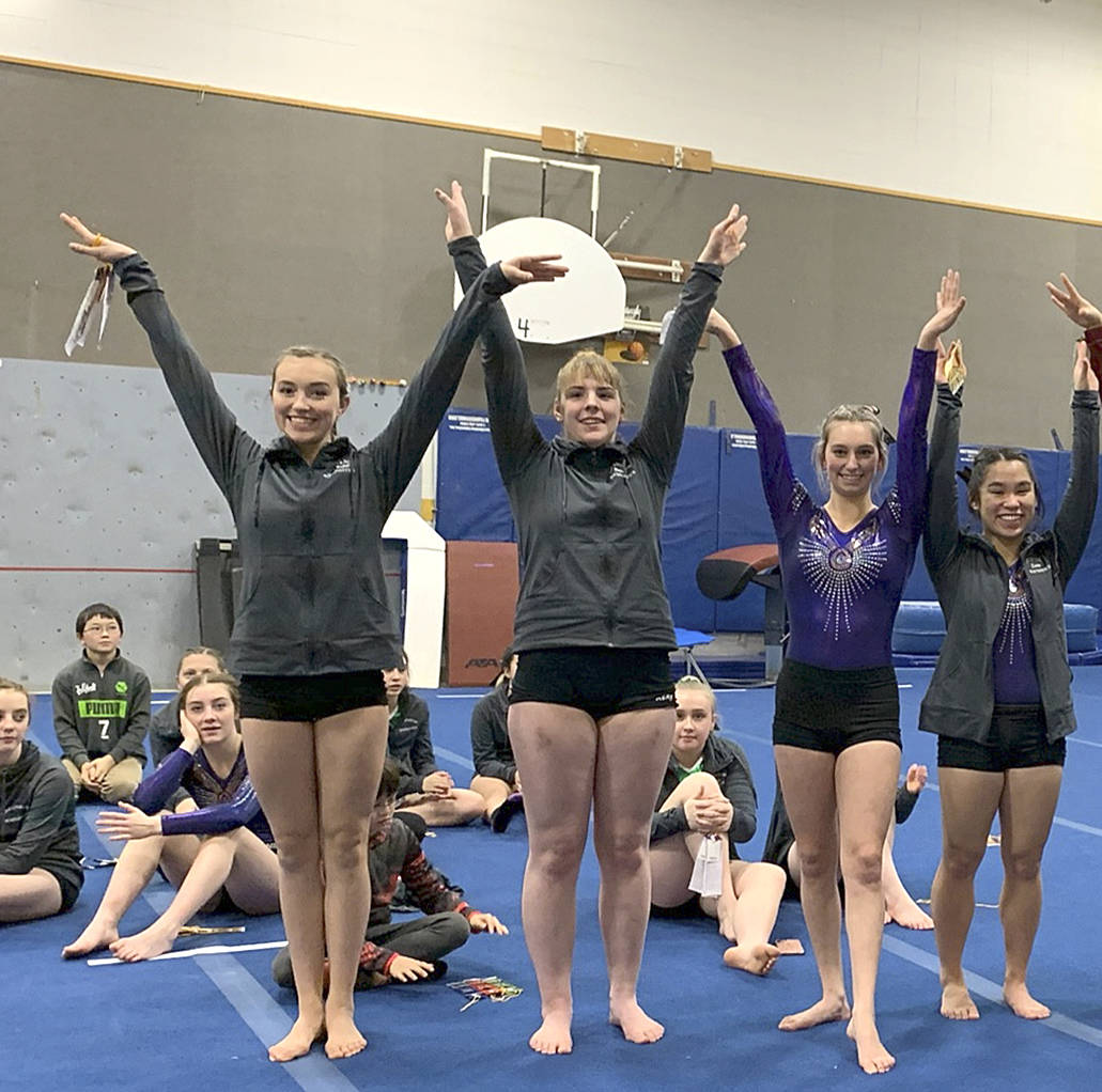 All-around winners from the Sequim-Port Angeles combined prep squad’s gymnastics win over Kingston on Dec. 20 are, from left, Sequim’s Gracie Sharp, Port Angeles’ Aiesha LaTourette, Sequim’s Emma Sharp and Sequim’s Lesae Pfeffer. Photo by Jackie Mangano