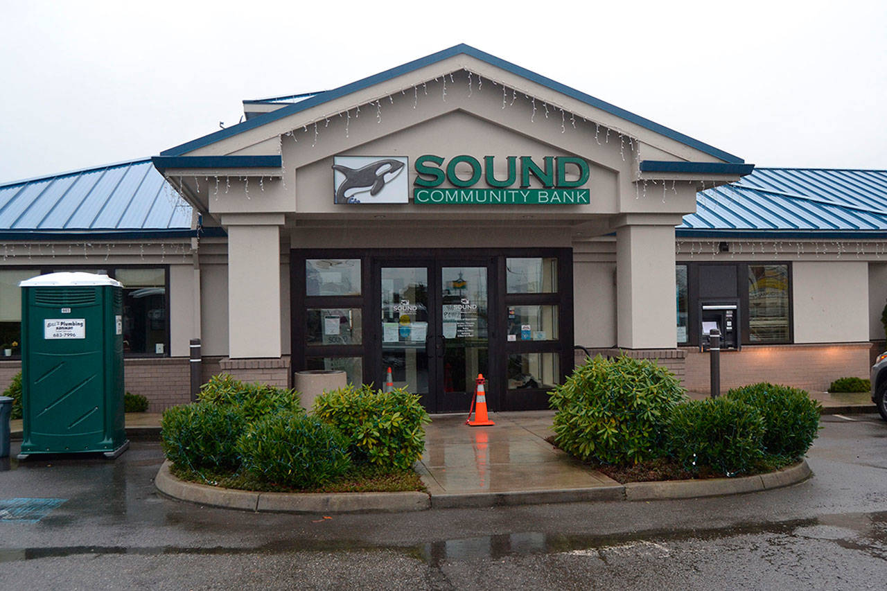 Bank officials reopened Sequim’s Sound Community Bank on Dec. 23 after flooding in its basement affected the branch’s electrical system on Dec. 20. Shelli Robb-Kahler, the bank’s hub manager/vice-president, said they’ve restored power and the branch is full service. Work will begin soon on new sewage discharge lines, she said. Sequim Gazette photo by Matthew Nash
