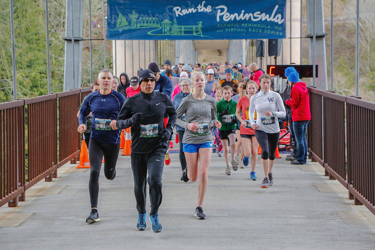 Runners and walkers break from the starting line at the 2019 Elwha Bridge 5k/10k. The 2020 event is set for Saturday, Feb. 1. Submitted photo