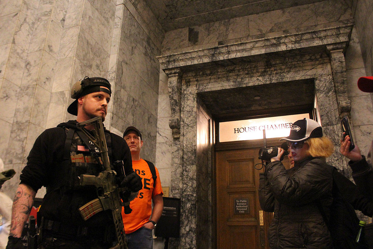 Gun rights advocate warns crowd of the potential need for forceful resistance in the future at gathering outside House of Representatives chamber. Photo by Cameron Sheppard/WNPA News Service