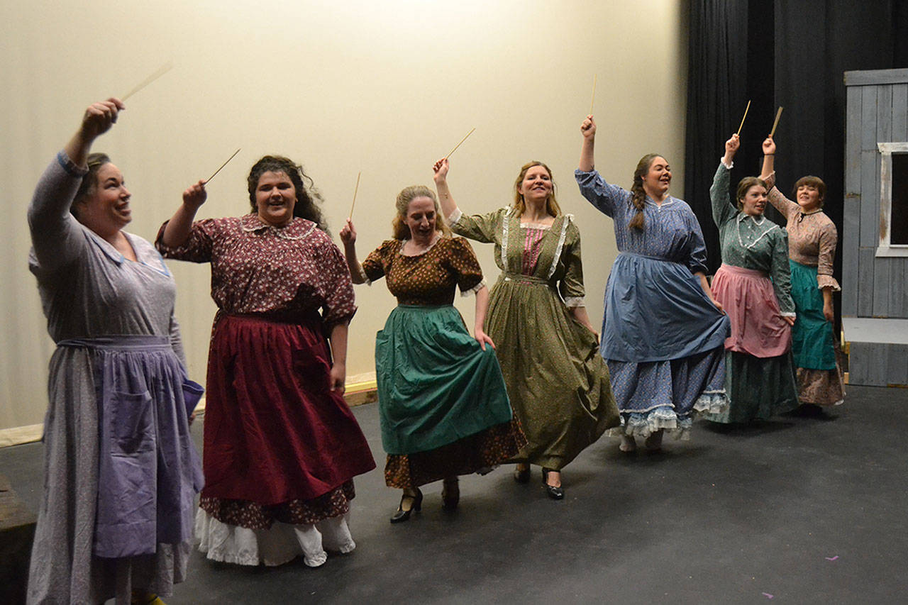 Actresses in “Quilters,” from left, SaraJane Benjamin, Maddie Montana, Susan Cates, Sarah Shea, Marissa Wilson, Charisa Silliman, and Gabi Simonson perform the song “Thread the Needle.” Sequim Gazette photo by Matthew Nash