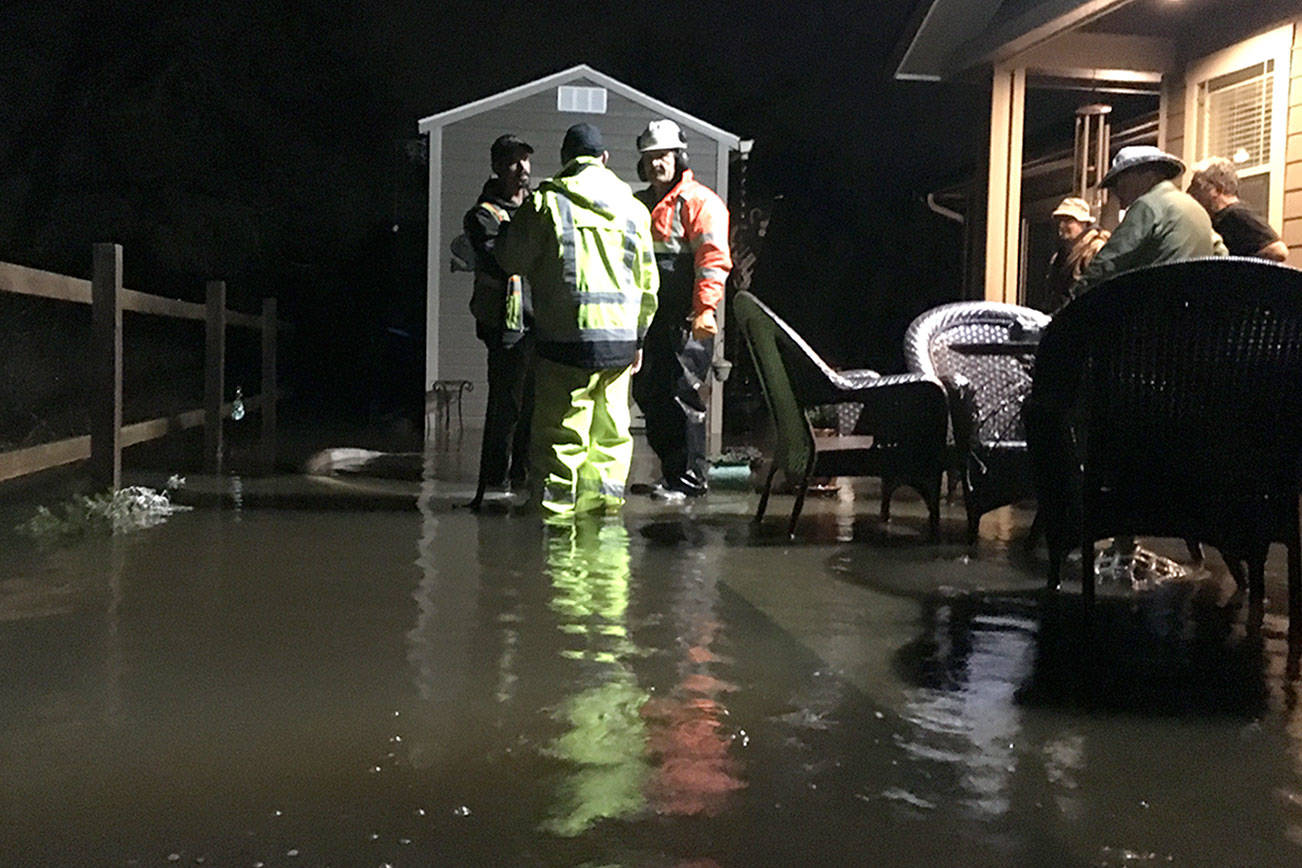 City crews, neighbors prevent flood damage