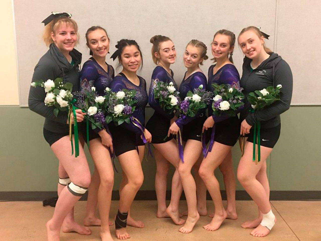 Competing for Sequim and Port Angeles gymnastics teams at the West Central District meet this past weekend are, from left, Aiesha LaTourette, Gracie Sharp, Lesae Pfeffer, Danica Pierson, Kori Miller, Emma Sharp and Maizie Tucker. Submitted photo