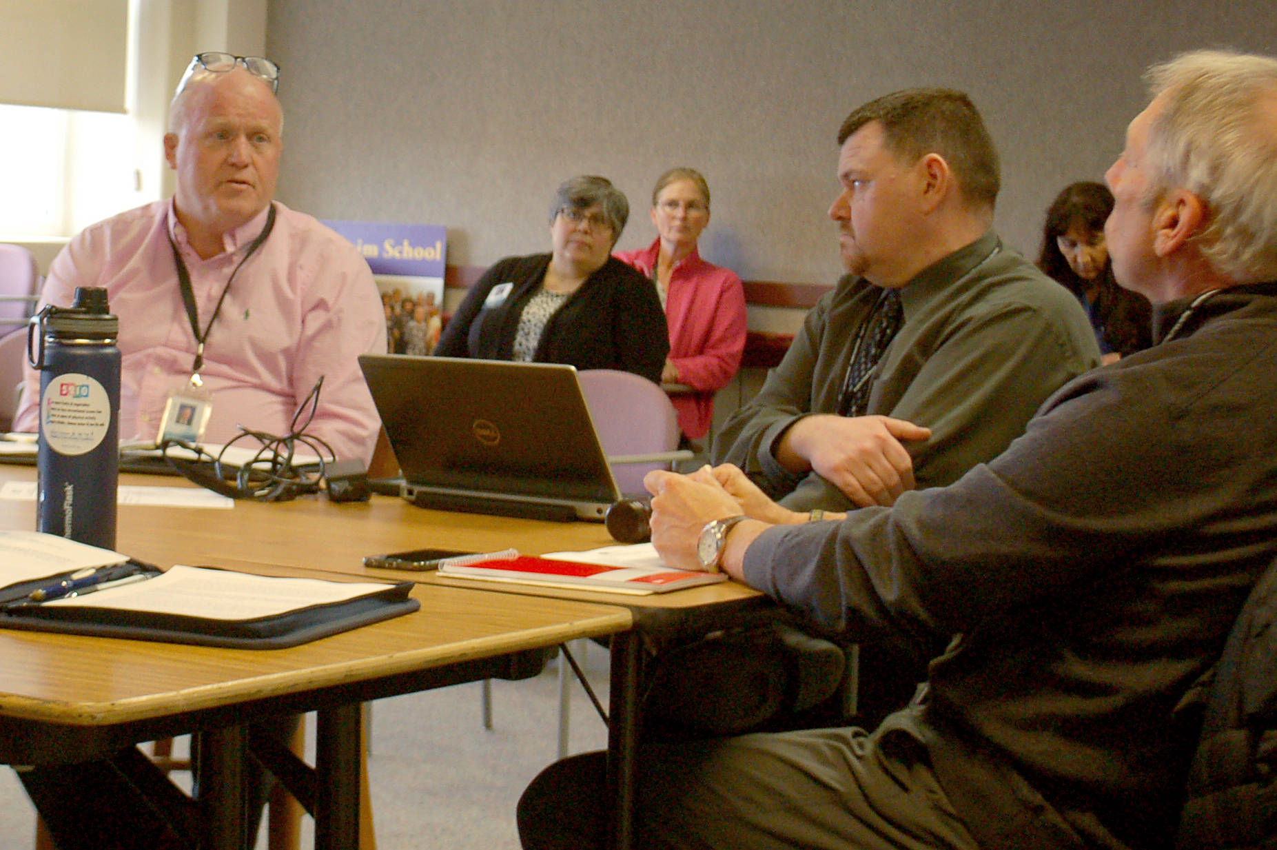 Sequim School District superintendent Dr. Rob Clark, left, discusses coronavirus planning with members of the school board at a special board meeting on March 12. Sequim Gazette photo by Conor Dowley