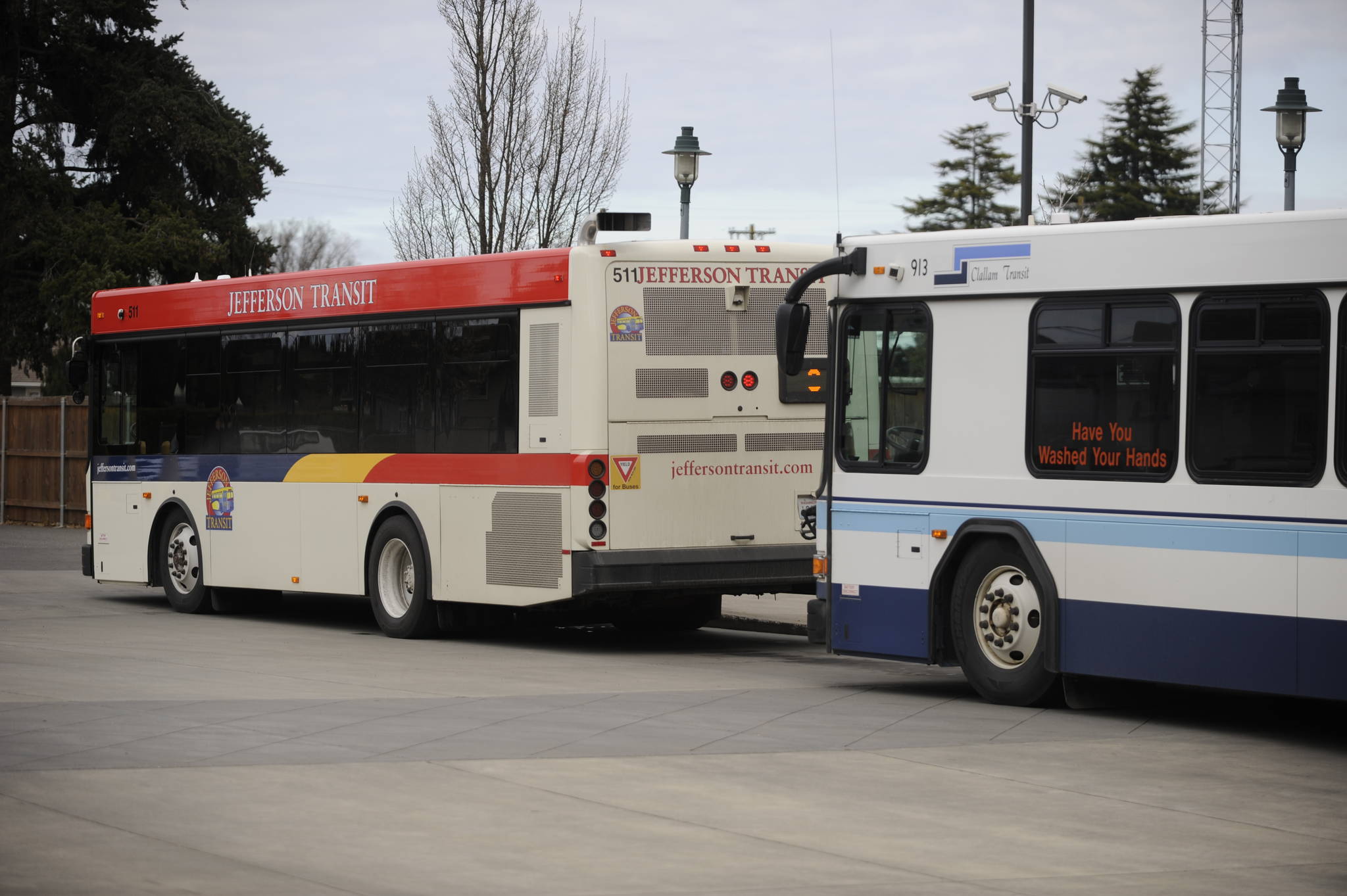 Clallam and Jefferson Transit buses at the Sequim Transit Center last week feature messages about sanitary practices. Sequim Gazette photo by Michael Dashiell